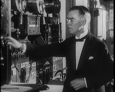 Male Civilian Working Theatrical Equipment Back Stage at a Theatre, 1920s. Creator: British Pathe Ltd.
