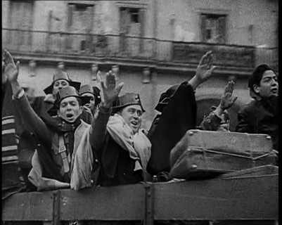 Spanish Fighters on the Back of a Lorry Making Fascist Salutes and Celebrating the Victory..., 1939. Creator: British Pathe Ltd.