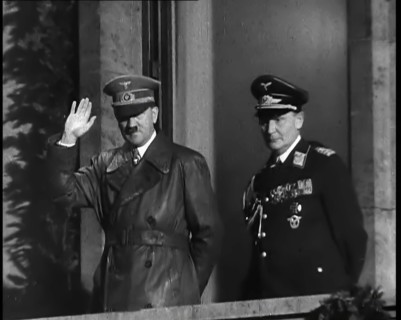Adolf Hitler, the German Leader, Saluting the Crowd with Hermann Goering on the...,1937 Creator: British Pathe Ltd.