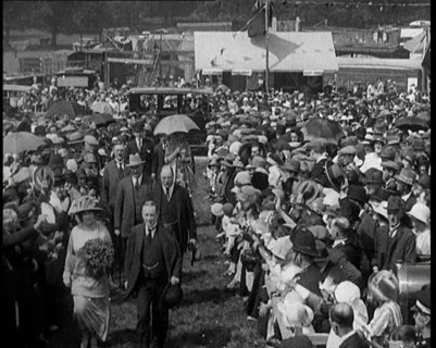 A Group of Politicians Walking Through a Large Crowd of People, 1920s. Creator: British Pathe Ltd.