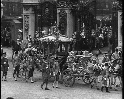 The Royal Coach, Horses, and Procession Filing Out of the Gates and Turning Left at the..., 1937. Creator: British Pathe Ltd.