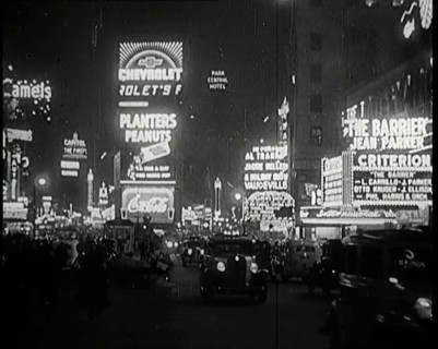 New York Times Square at Night Lit up By Lights, 1920s. Creator: British Pathe Ltd.