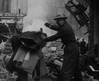 Men Clearing Out Possessions from a Bombed Out Building, 1940. Creator: British Pathe Ltd.