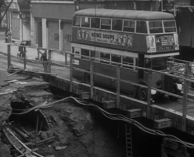 A Bus Driving Across a Wooden Bridge, 1940. Creator: British Pathe Ltd.