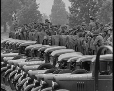 US Army Trucks and Cars Lining the Road, 1932. Creator: British Pathe Ltd.
