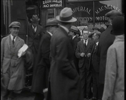 Civilians Disembarking from a Bus On the Streets of London, 1920s. Creator: British Pathe Ltd.