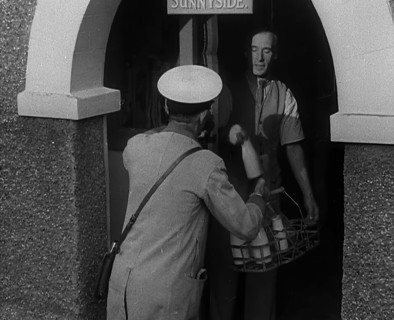 A Man Delivering Milk, 1940. Creator: British Pathe Ltd.