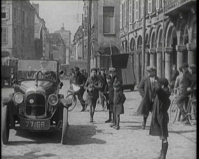 Male British Civilian Driving a Car Executing a Turning Manoeuvre On the Streets of London..., 1920s Creator: British Pathe Ltd.