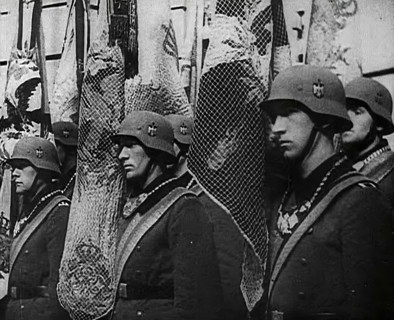 German Soldiers Standing With Flags, 1941. Creator: British Pathe Ltd.