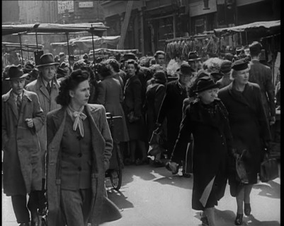 People Moving Along Crowded Streets, 1940. Creator: British Pathe Ltd.