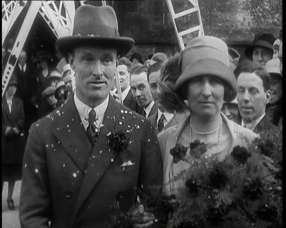 Male Civilian (Groom) And Female Civilian (Bride) Emerging from a Church To Walk Through an...,1927 Creator: British Pathe Ltd.