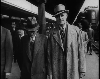 Henry Ford and His Entourage Walking Towards the Camera, 1930s. Creator: British Pathe Ltd.