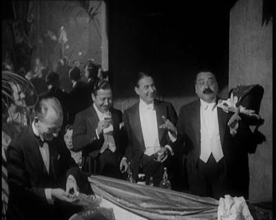 Four Male Civilians Standing Together. They Smile For the Camera, 1924. Creator: British Pathe Ltd.