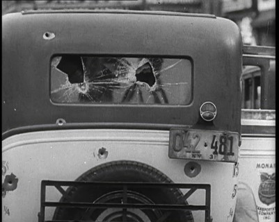 Bullet Holes Through the Back Window of a Car, 1932. Creator: British Pathe Ltd.
