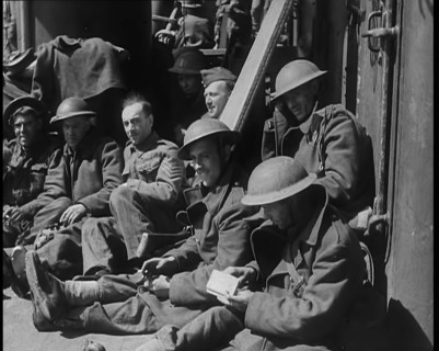 British Soldiers Sitting Aboard a Ship Taking Them Across the Channel Following the..., 1940. Creator: British Pathe Ltd.