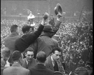 Everton Players Waving to Crowds With the FA Cup, 1930s. Creator: British Pathe Ltd.