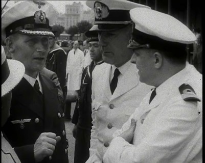 Captain Hans Langsdorff of the German Battleship Graf Spee Talking With Other Naval Officers, 1939. Creator: British Pathe Ltd.