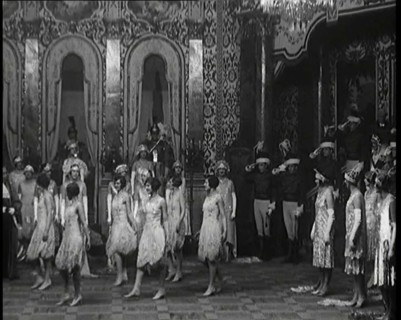 Scene from the Musical Princess Charming: a Group of Actors Dancing As the Actor Playing..., 1920s. Creator: British Pathe Ltd.