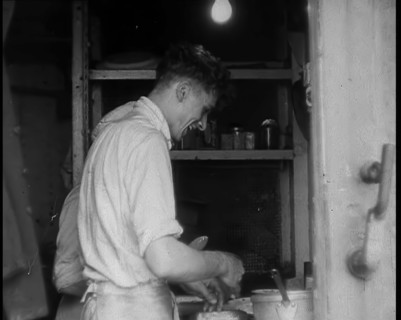 British Cooks Preparing Food for Soldiers Aboard a Ship Evacuating Dunkirk, 1940. Creator: British Pathe Ltd.