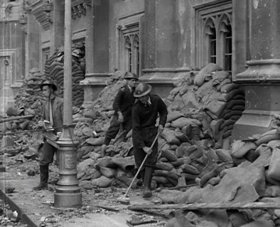 British Air Raid Wardens Clearing up Rubble Around the Palace of Westminster, 1941. Creator: British Pathe Ltd.