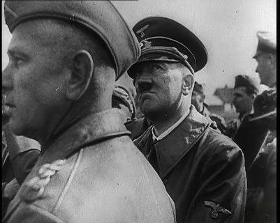 Adolf Hitler Standing With a Group of Other Male German Military Commanders, 1939. Creator: British Pathe Ltd.