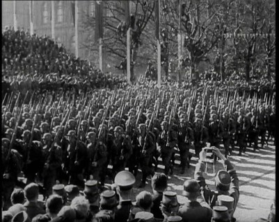 A Formation of Male German Soldiers Marching Past a Raked Platform of Officials on a Vienna..., 1938 Creator: British Pathe Ltd.
