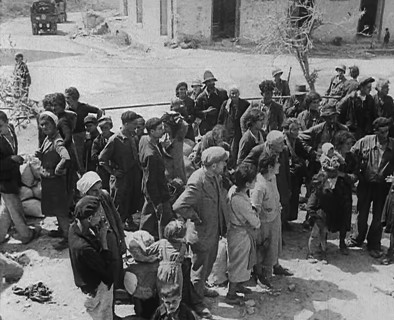 Italian Civilians in a Bomb-Damaged Italian Town, 1943-1944. Creator: British Pathe Ltd.