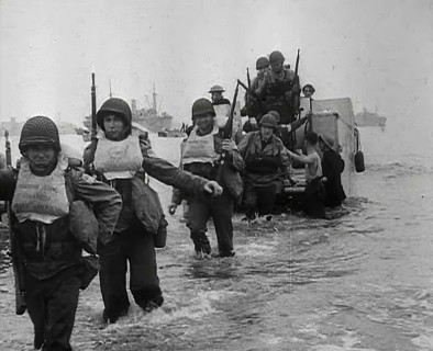 American Troops Walking Onto a North African Beach as Part of 'Operation Torch’, 1942. Creator: British Pathe Ltd.