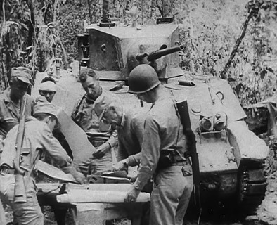 Commonwealth Troops Planning Next to a Tank, 1943. Creator: British Pathe Ltd.