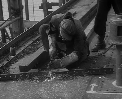 A Factory Worker Constructing Part of a Ship, 1943. Creator: British Pathe Ltd.