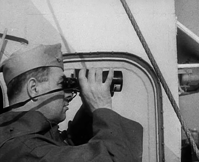 A Sailor Using Binoculars, 1943. Creator: British Pathe Ltd.