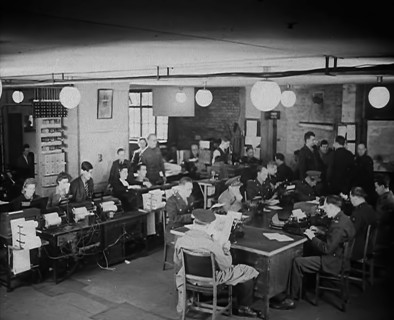 Uniformed Press Officers Working, 1943. Creator: British Pathe Ltd.