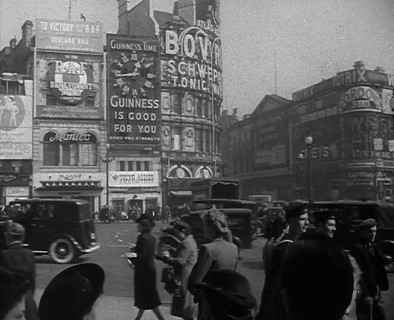 People and Traffic Moving Across Piccadilly Circus, 1943. Creator: British Pathe Ltd.