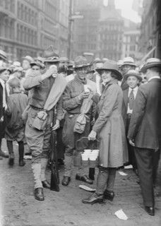 Emma Rencken "watering" soldiers, between c1915 and c1920. Creator: Bain News Service.