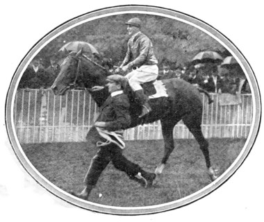 Leading in the winner of the Grand Prix, Baron M. de Rothschild's Verdun (M. Barat up), 1909. Creator: Topical Press Agency.