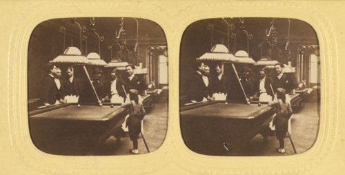 Men playing billards, one little boy holding a cue stick, about 1868. Creator: E Lamy.