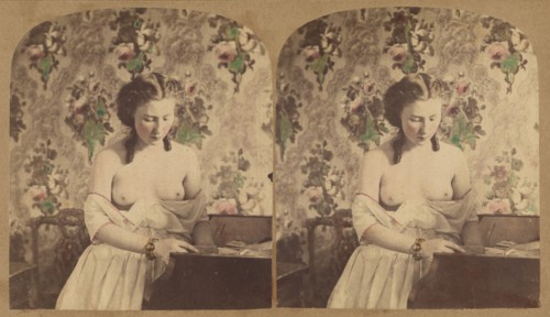 Bare-breasted woman looking down, about 1870. Creator: Unknown.