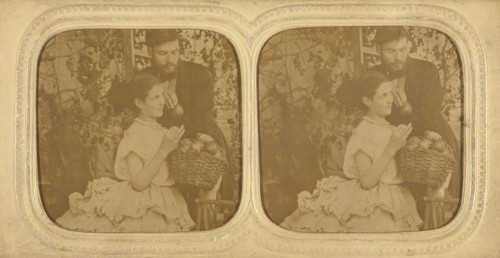 Unidentified couple: bearded man holding a single piece of fruit with a woman holding..., about 1865 Creator: Unknown.
