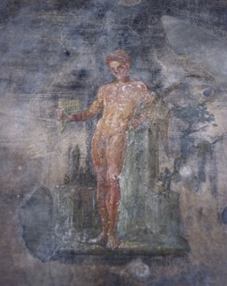 Young man playing the flute, House of the Vettii, Pompeii, Italy, 1st century. Creator: Unknown.