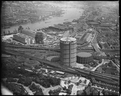 Battersea Power Station under construction and the Gas Holder Station, Nine Elms, London, c1930s. Creator: Arthur William Hobart.