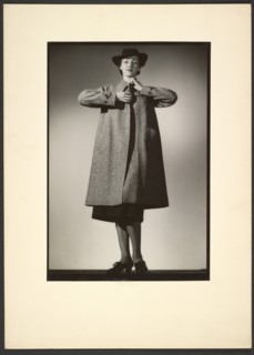 Woman modeling a coat, early 1940s. Creator: Gunther Krampf.