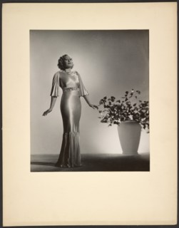 Portrait of woman in gown, late 1930s. Creator: Gunther Krampf.