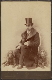 Portrait of a Moustachioed Seated Man in Top Hat and Winter, Fur-Collared Coat..., about 1890. Creator: Lewis Peavey.