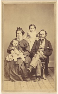 Family portrait: mother, father and two children, 1870s. Creator: BF Green.