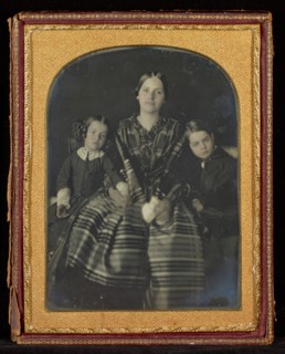 Portrait of a Seated Woman with a Young Girl and Boy on Either Side, about 1850s. Creator: Unknown.