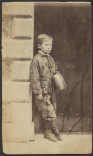 Portrait of a Young Boy in a Doorway, late 19th century. Creator: Unknown.