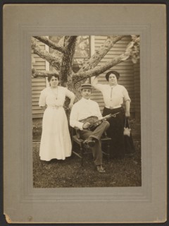 Portrait of a man and two women, about 1890-1900. Creator: Unknown.