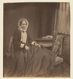 Portrait of a woman, wearing a bonnet, seated, 1850s. Creator: Roger Fenton.