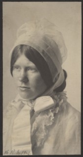 Portrait of woman in bonnet, 1908. Creator: Mary R Stanbery.