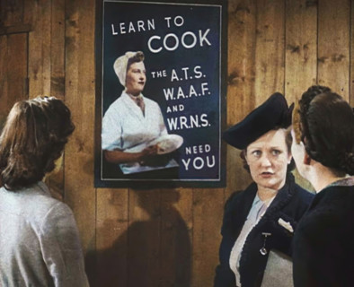 An Information Film Showing Women Looking at a Recruitment Poster for Female Army Cooks, 1942. Creator: British Pathe Ltd.